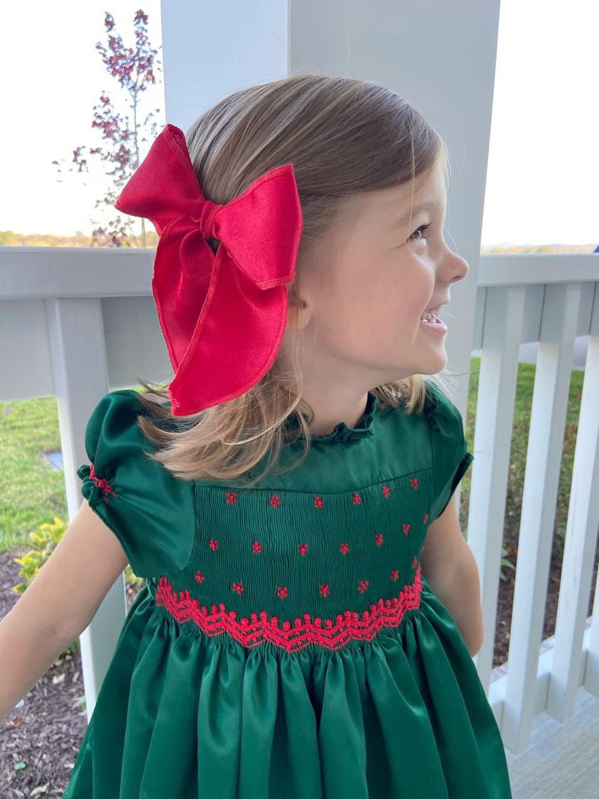 Charlotte sy Dimby classic timeless traditional smocked dresses for babies and girls handmade French style children clothing paris boutique twirling princess dress green and red christmas holiday dress tennessee